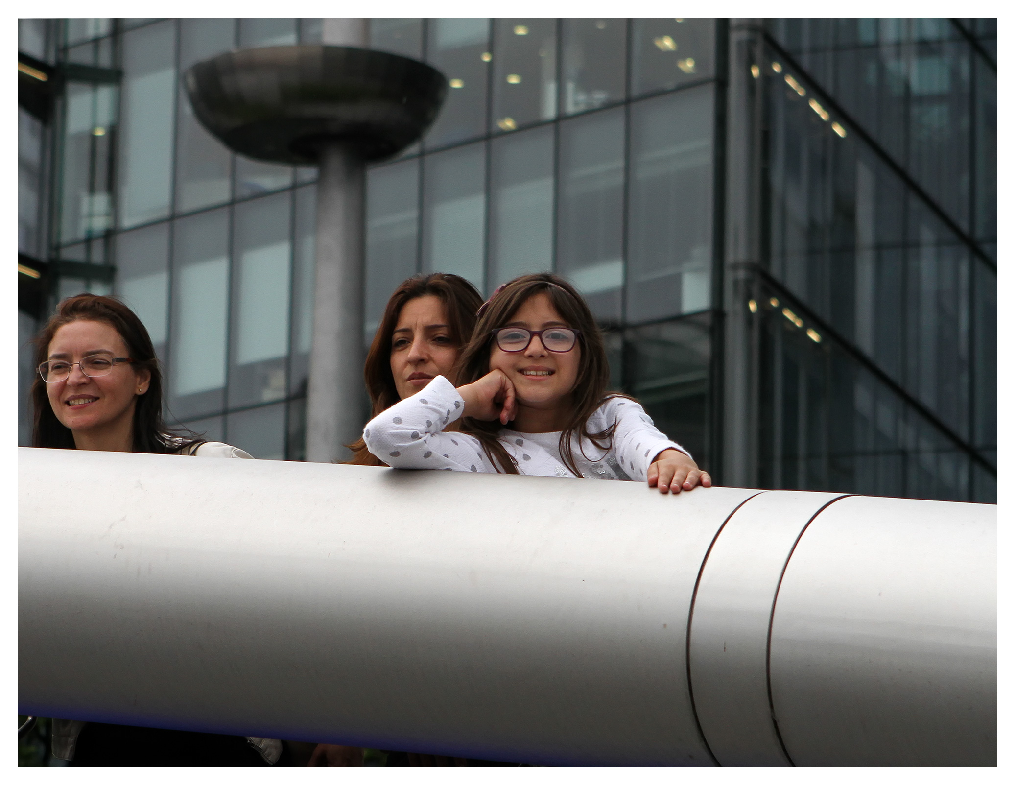 Young girl posing for her picture at 1 London Bridge, England